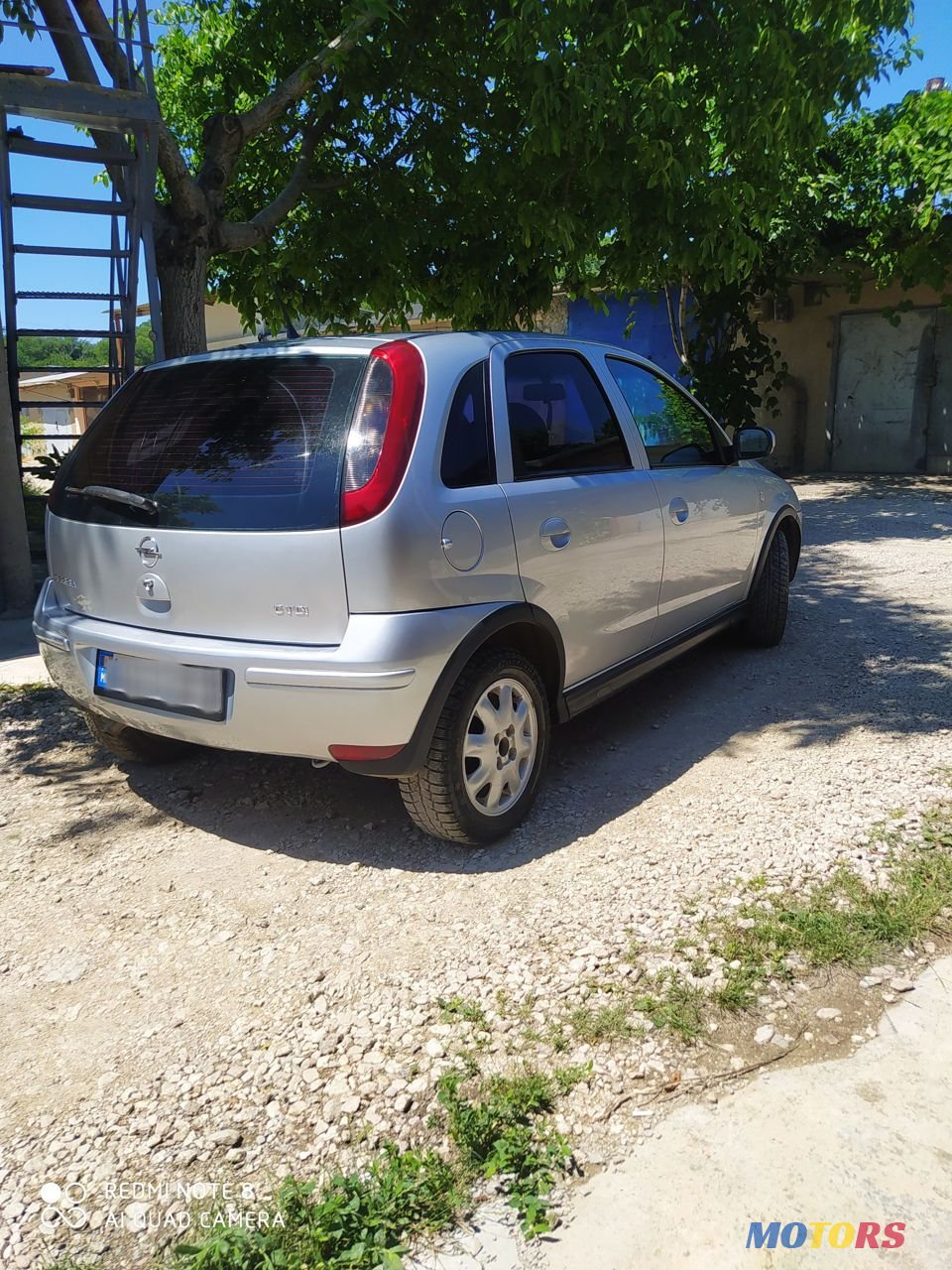 2004' Opel Corsa photo #3