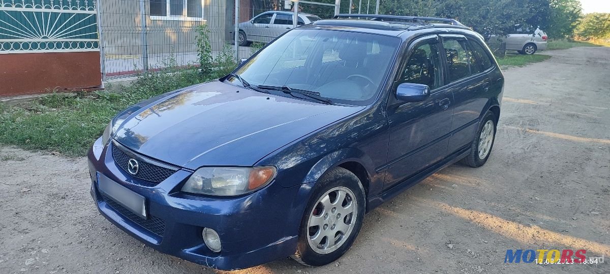 2002' Mazda 323 photo #1