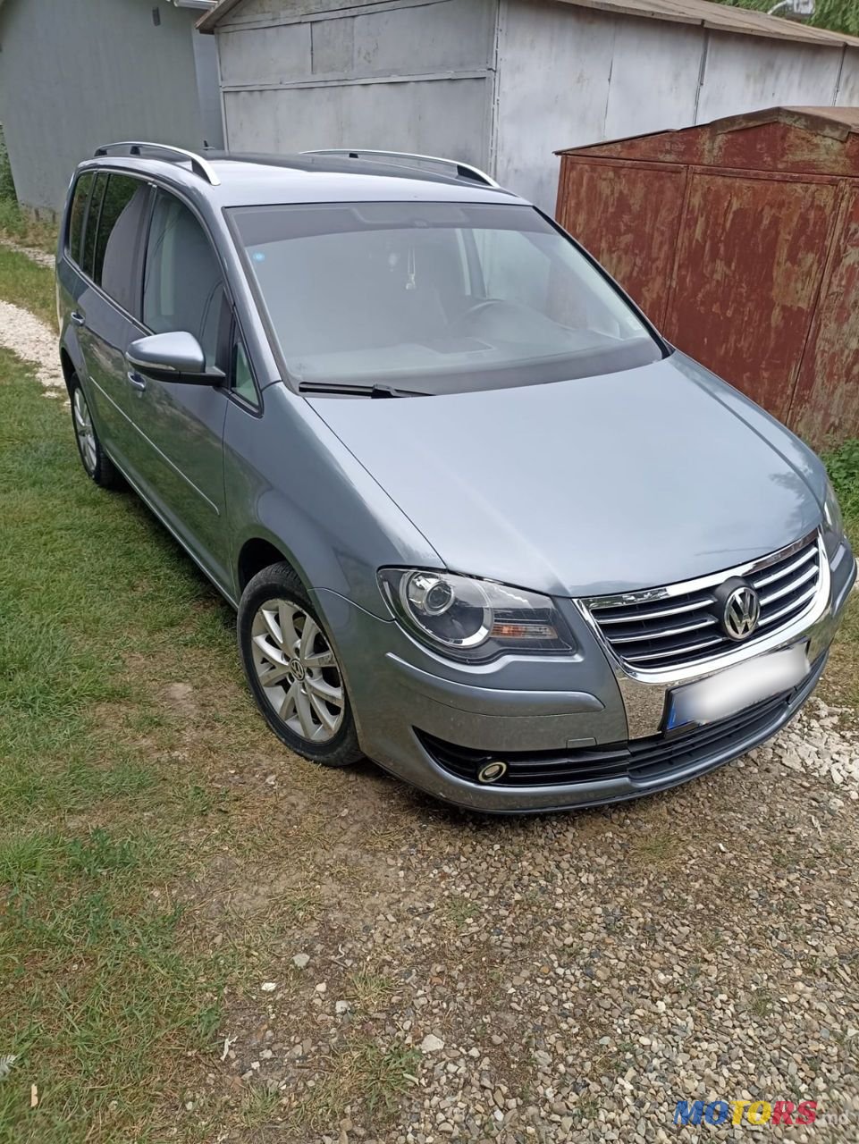 2010' Volkswagen Touran photo #1