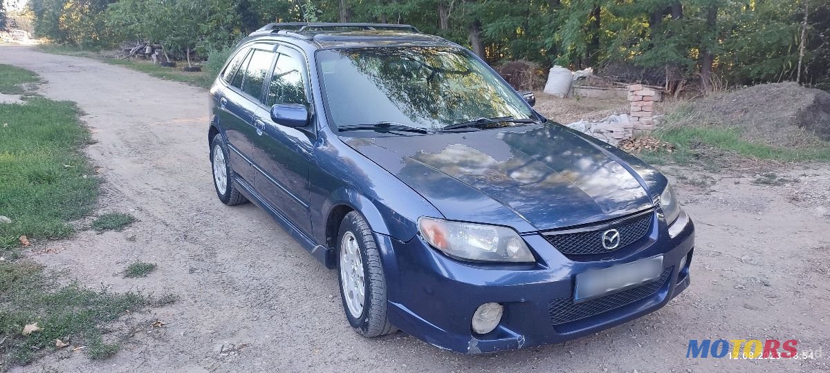 2002' Mazda 323 photo #2