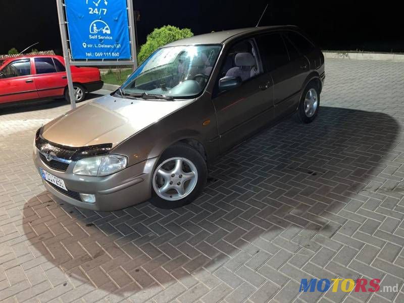 2000' Mazda 323 photo #5