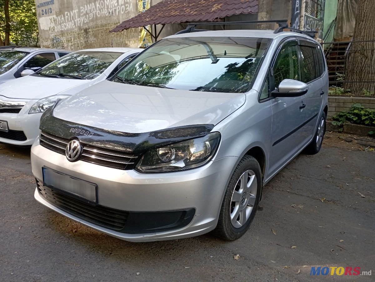 2014' Volkswagen Touran photo #1