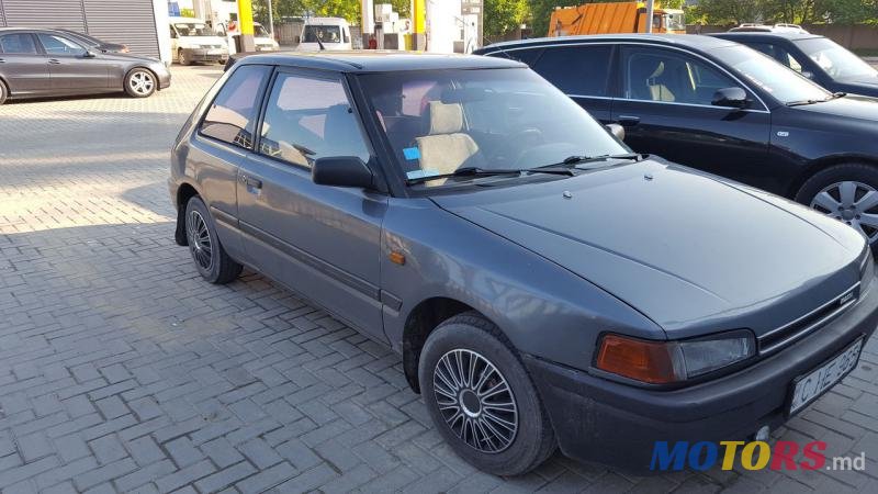 1993' Mazda 323 photo #1