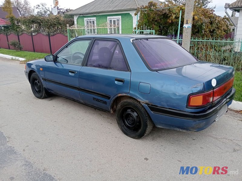 1990' Mazda 323 photo #6