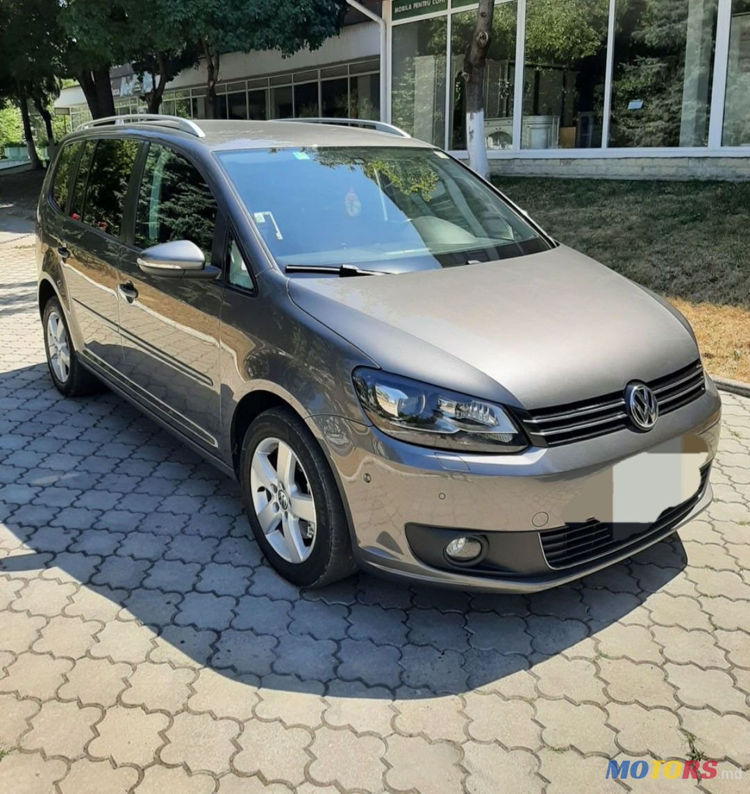 2014' Volkswagen Touran photo #1