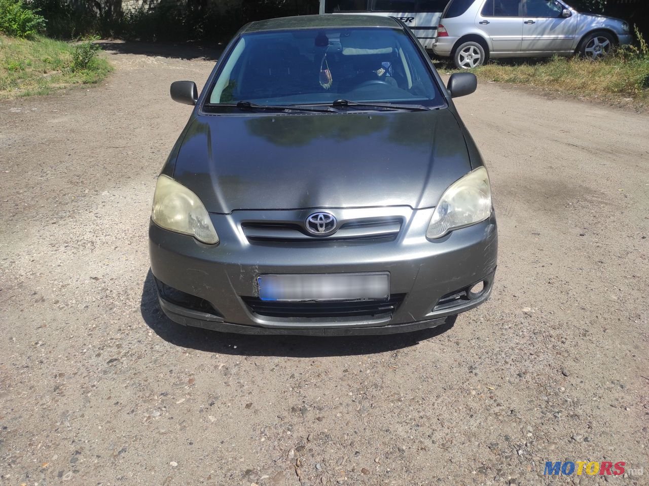 2004' Toyota Corolla photo #1