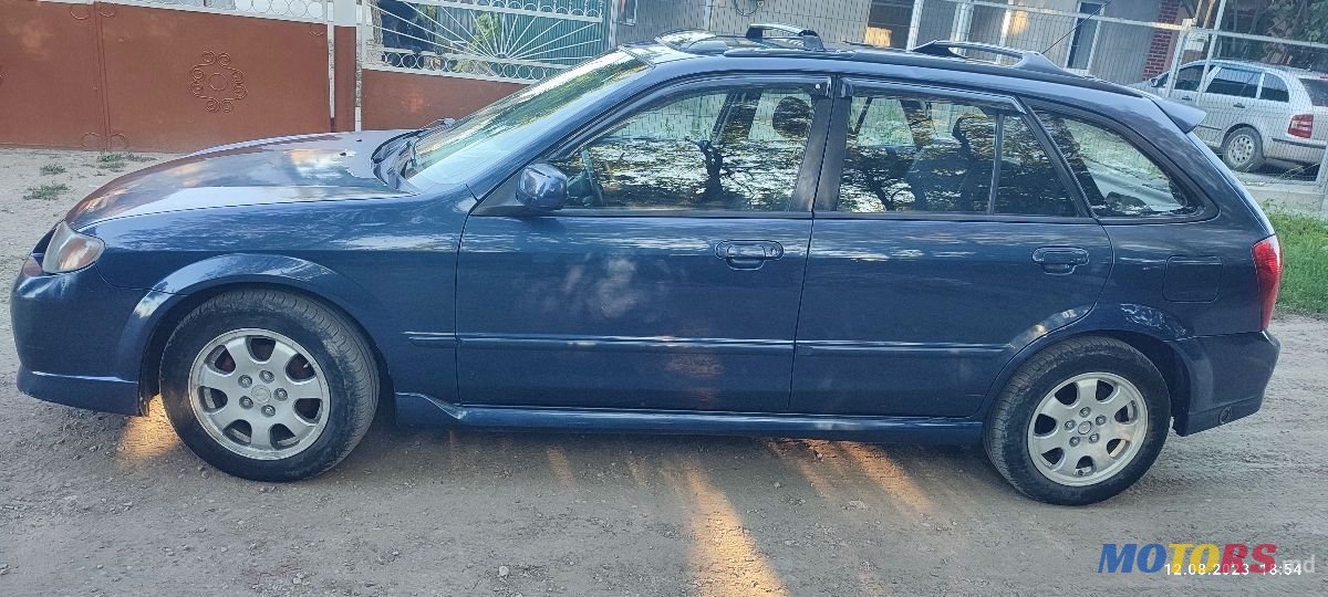 2002' Mazda 323 photo #3