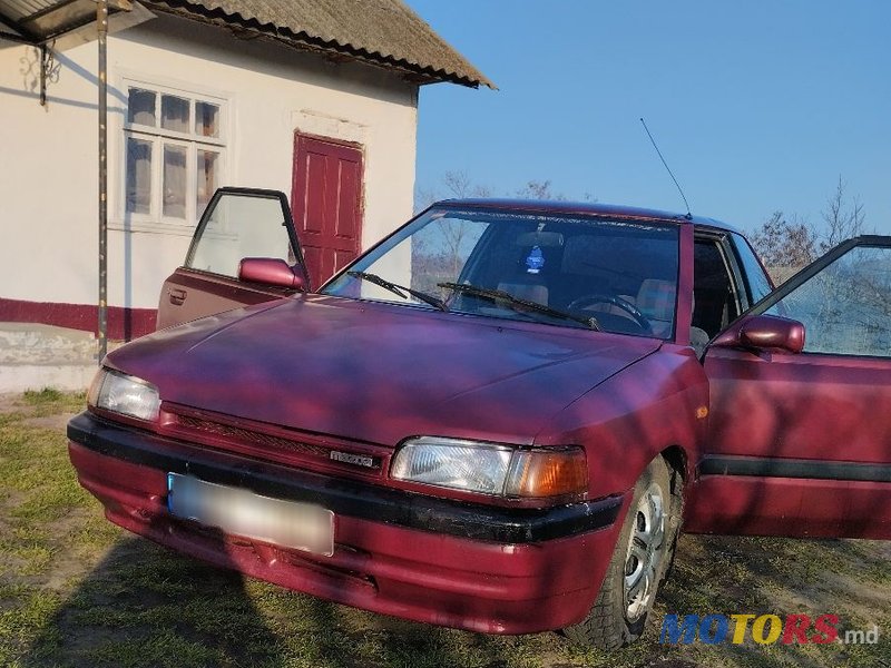 1993' Mazda 323 photo #1