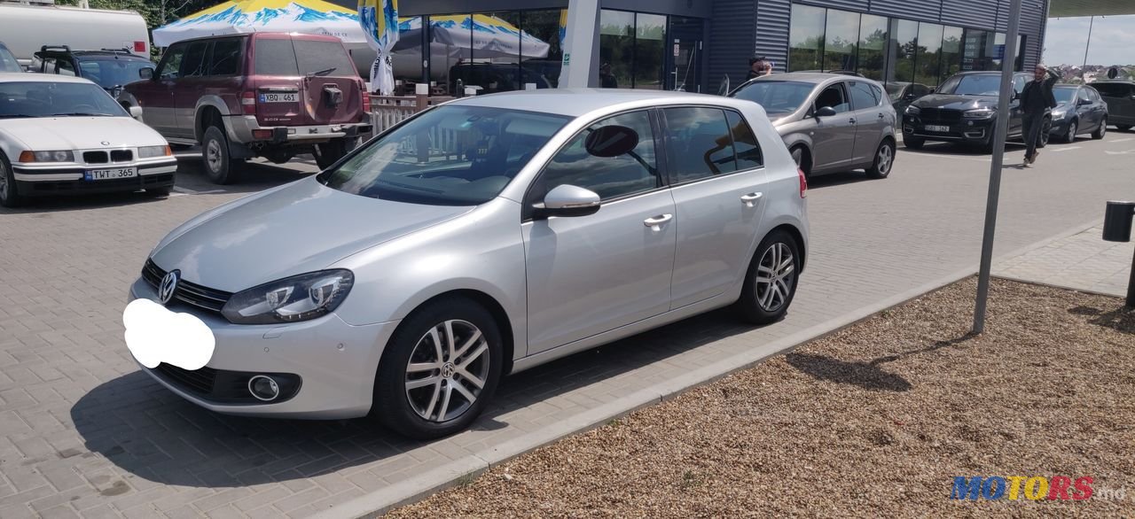 2011' Volkswagen Golf photo #3