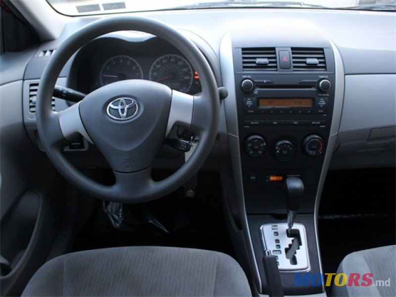 2010' Toyota Corolla LE photo #2