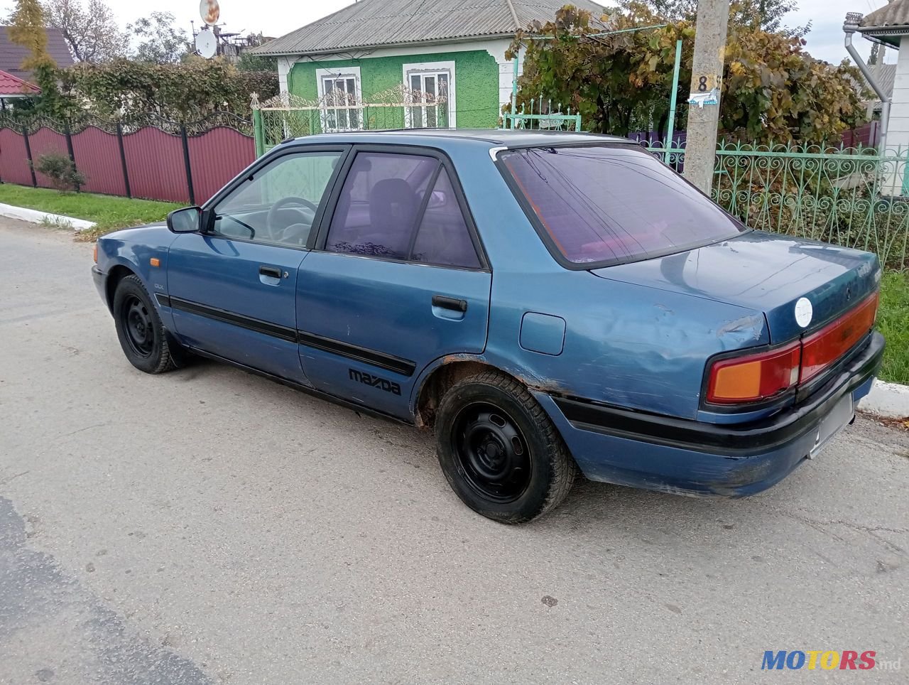 1990' Mazda 323 photo #6
