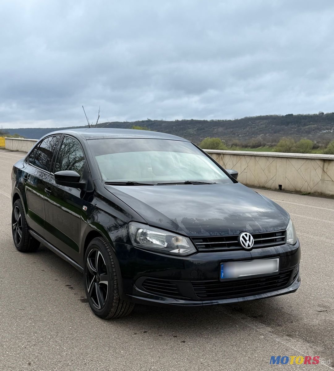 2011' Volkswagen Polo photo #1
