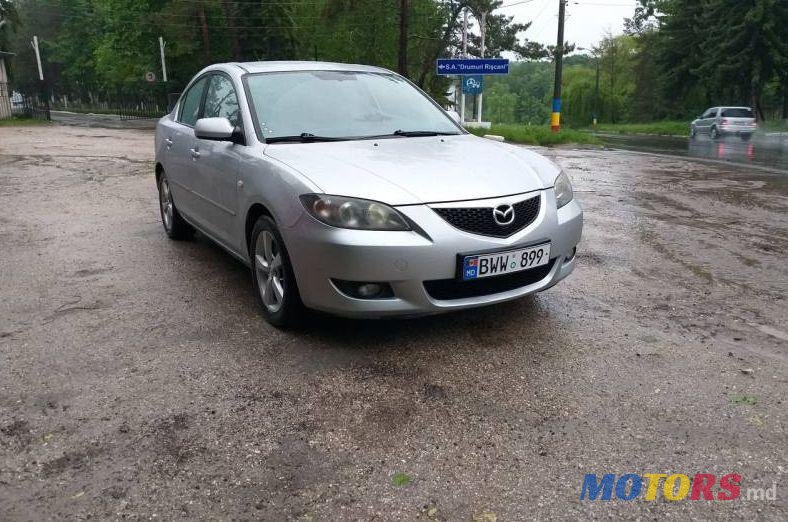 2004' Mazda 3 photo #1