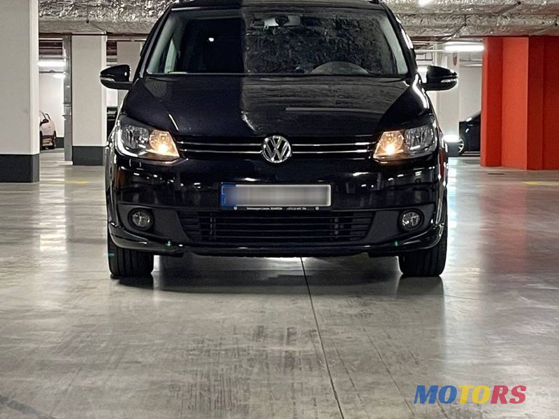 2014' Volkswagen Touran photo #1